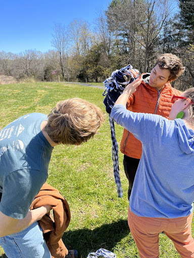 Instructor Lafroy Stevens gives feedback on an arm splint.